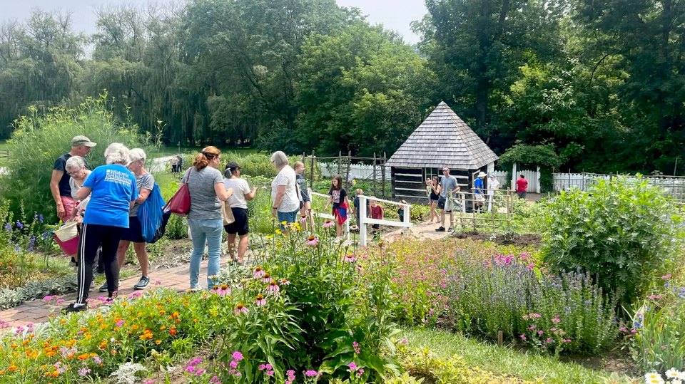 Guests and volunteers at the You Point, We Pick program at Burnside Gardens