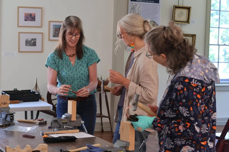A group of women learning jewelry sculpting at a Historic Bethlehem Museums & Sites craft class