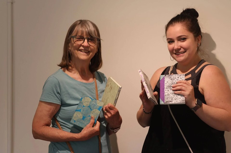 A group of bookbinding class attendees during the Bethlehem Maker's Retreat Weekend.