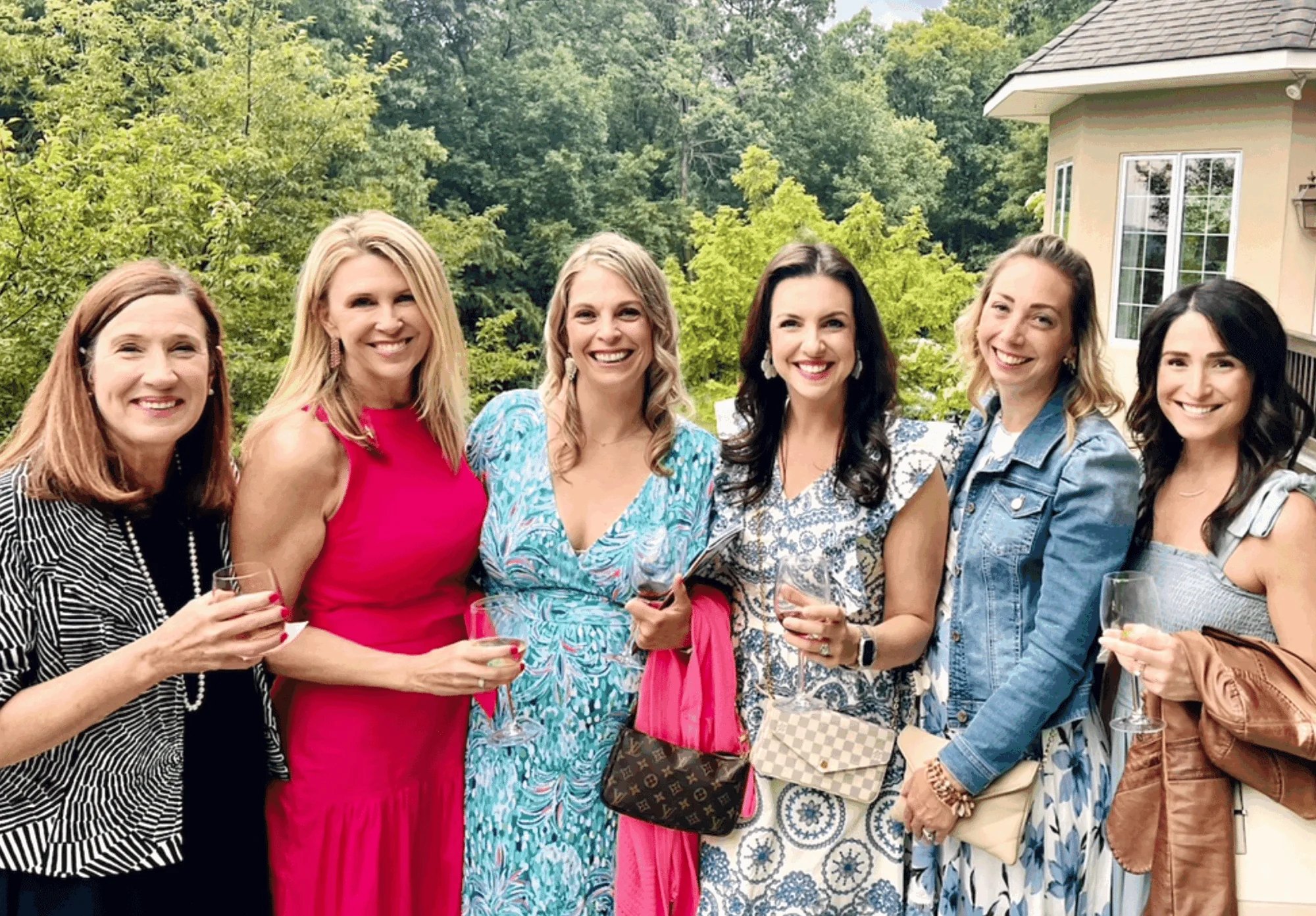 A group fo women gather at the 2023 Rooms to View Preview Night